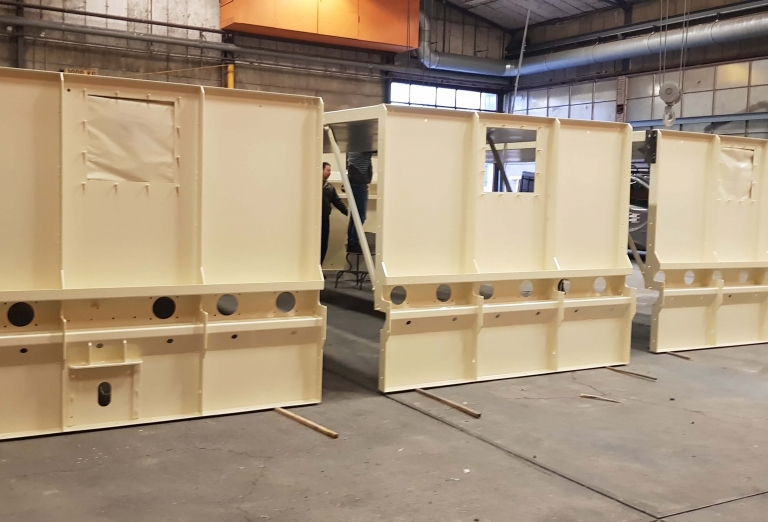 Drying of woodchips and sawdust on a belt dryer