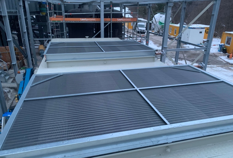 Drying of woodchips on a belt dryer